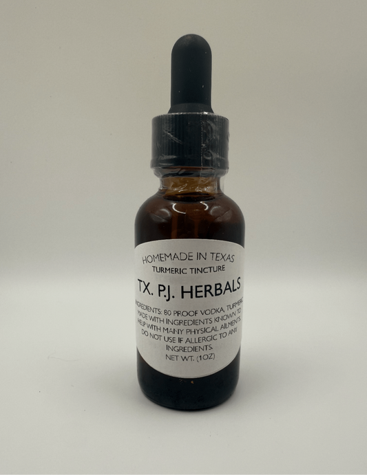 Bottle of homemade turmeric tincture by TX Pl Herbals with dropper for anti-inflammatory and joint health support